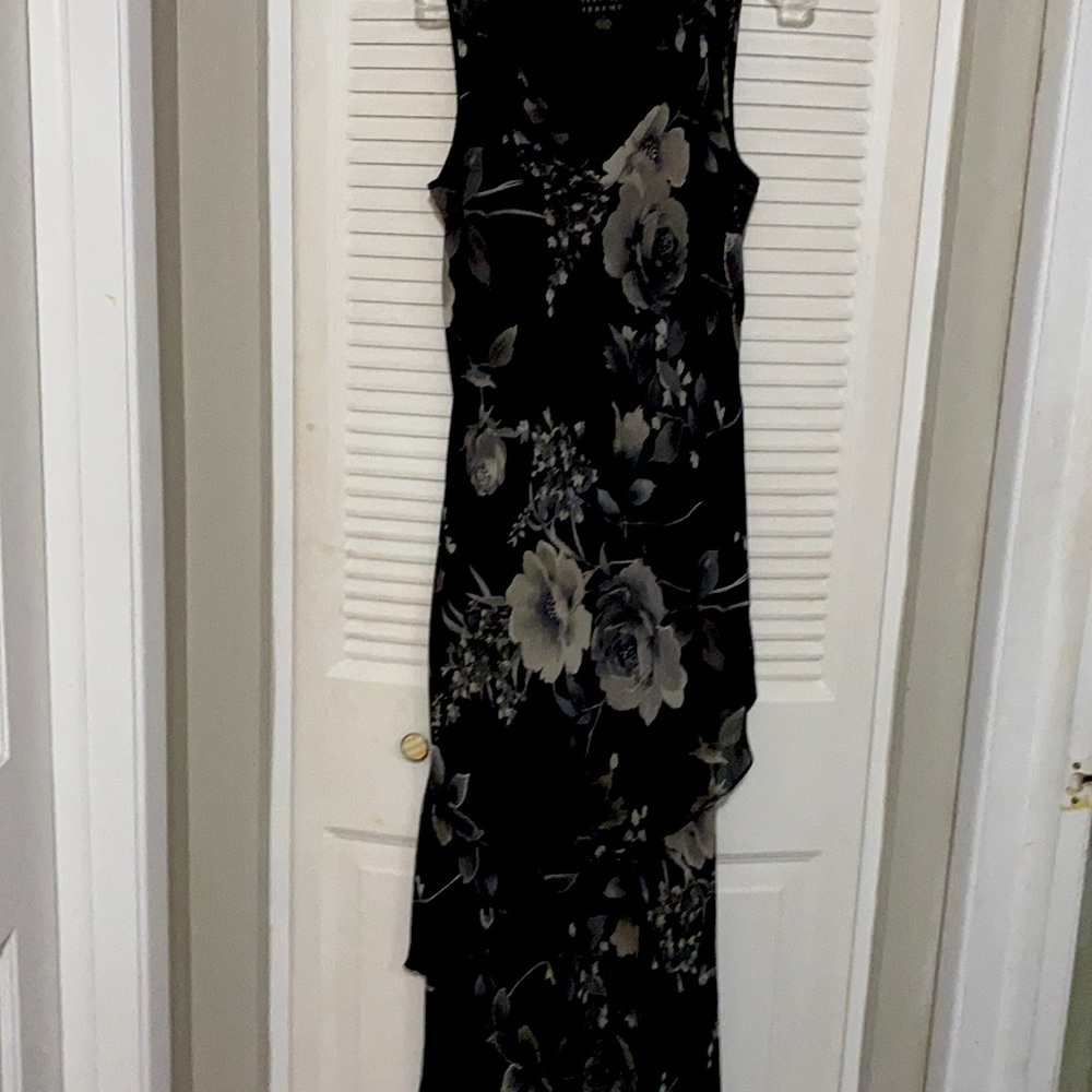 This is a  Black/Grey Maxim Layer Dress. Size 12. In good condition .